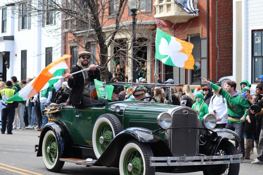 A man waves an Irish flag during the St. Patrick’s Day Parade Sunday. The parade drew over a million people to South Boston to celebrate the holiday.