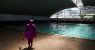 Elderly South African women swim for fitness.