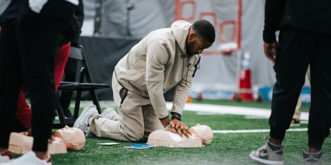 CPR training completed by Panthers, PSL owners, Tepper staff.