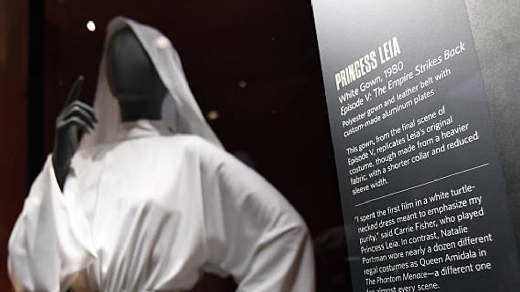 DENVER, CO - DECEMBER 27: The Princess Leia white  gown from Episode V on tour at the Star Wars exhibit at the Denver Art Museum December 27, 2016. Fans flocked to the exhibit after learning the news of Carrie Fisher, the actress best known as Star Wars Princess Leia Organa, passed away at 8:55 Tuesday morning. Fisher was flying from London to Los Angeles on Friday, Dec. 23, when she went into cardiac arrest. Paramedics removed her from the flight and rushed her to a nearby hospital, where she was treated for a heart attack. She was 60. (Photo By John Leyba/The Denver Post via Getty Images)