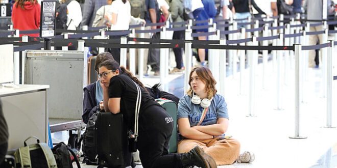 Holiday travel plagued by anticipated delays, inconveniences.