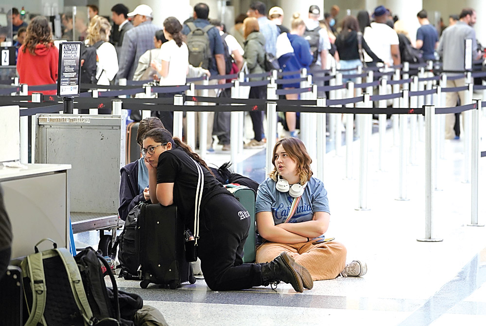 Holiday travel plagued by anticipated delays, inconveniences.