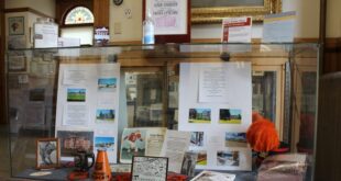 Local businesses' recent history showcased in centennial exhibit.