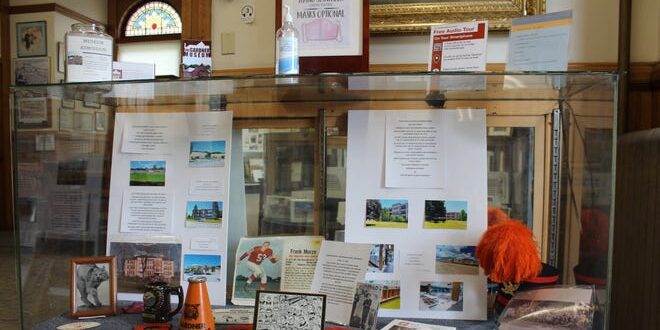 Local businesses' recent history showcased in centennial exhibit.