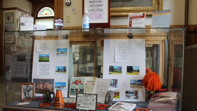 Local businesses' recent history showcased in centennial exhibit.