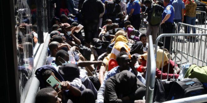 Worsening NYC migrant crisis compels sidewalk sleep.