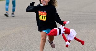 Hundreds race for grants at Sunrise Stampede 5K.