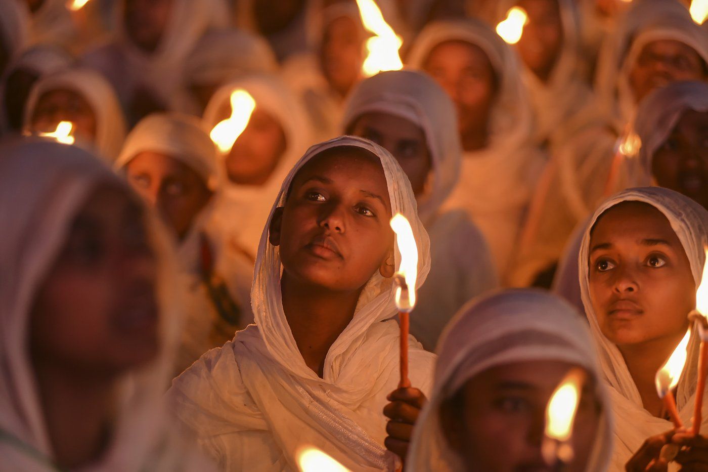 Ethiopian pilgrims pray during a Mass service for Ethiopian Christmas at the Bole Medhane Alem cathedral in Addis Ababa, Ethiopia, Monday, Jan. 6, 2025. (AP Photo)